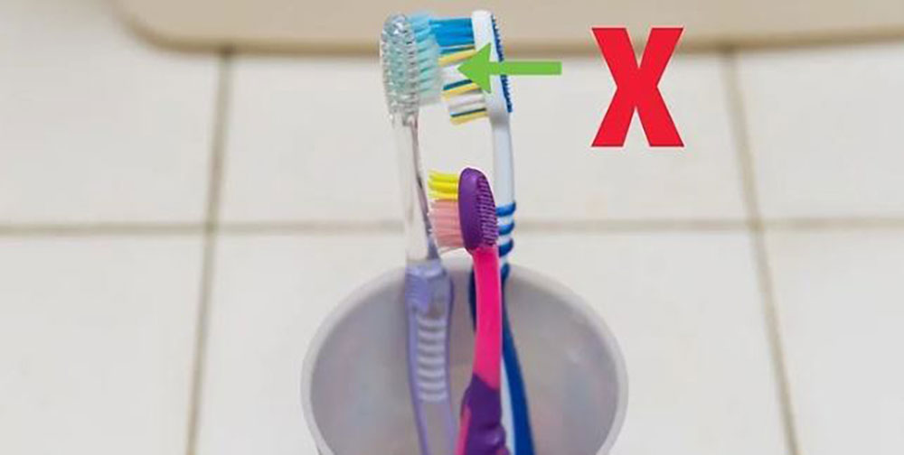 place toothbrush vertically