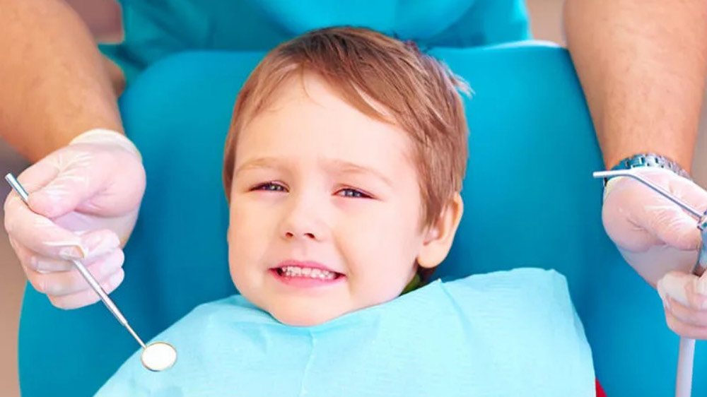 کودکی که از دندانپزشک می ترسد